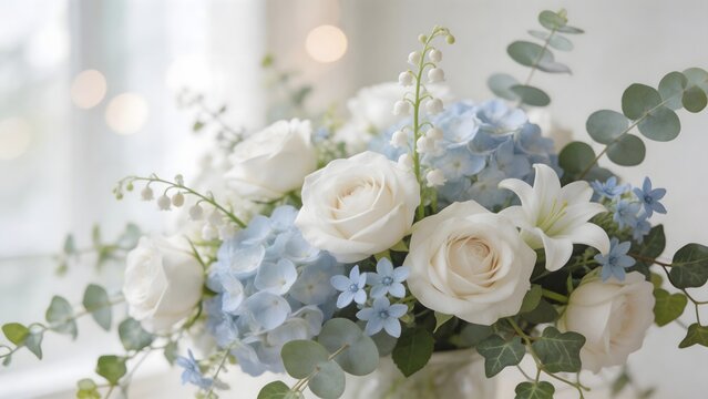 Floral arrangement with white roses and blue flowers