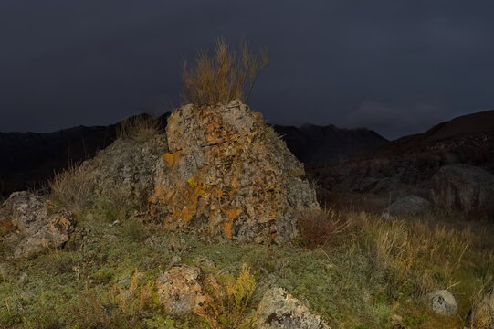 Russia. The South of Western Siberia, the Altai Mountains. Autumn moonlit night in the stone valley of the mountain river Katun near the village of Inia.