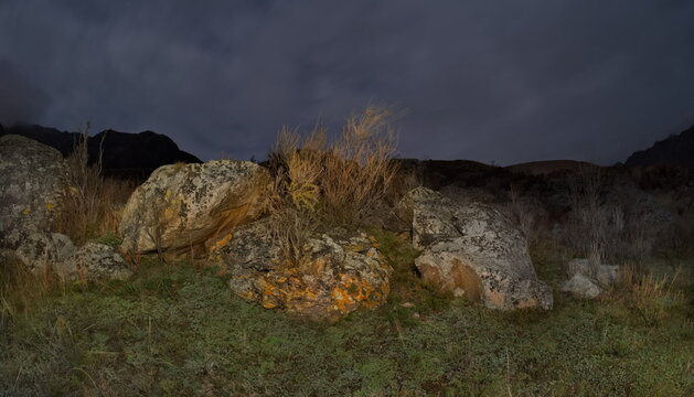 Russia. The South of Western Siberia, the Altai Mountains. Autumn moonlit night in the stone valley of the mountain river Katun near the village of Inia.