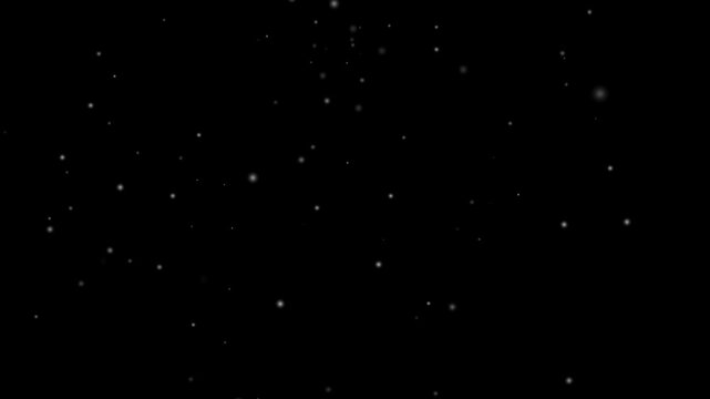 White Super slow motion floating dust particles in the air, isolated on black background, particles, snow flakes slowly falling densely against black background. slow falling snow on
