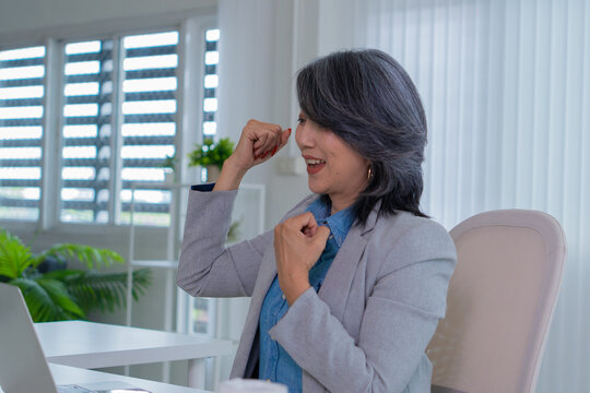 Confident female executive representing productivity and leadership