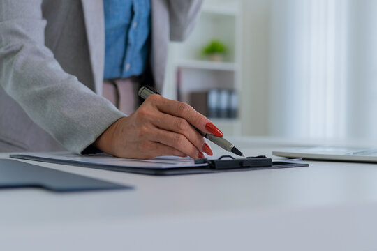 Confident female executive representing productivity and leadership