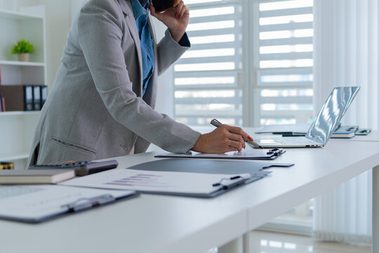 Confident female executive representing productivity and leadership