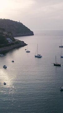 Aerial view of yachts and boats in Port Soller, Mallorca at sunset