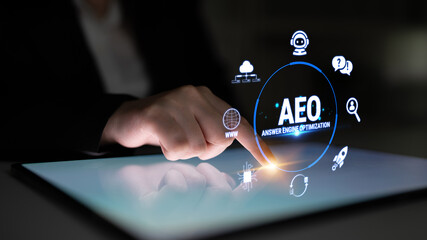 Naklejka premium Business professional interacting with digital interface showcasing AEO concept, emphasizing modern trends in digital marketing and engagement strategies Fluxor.