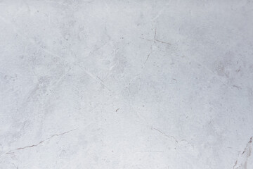 Fototapeta premium Light gray textured surface with subtle patterns for backgrounds and design projects