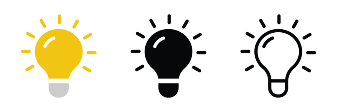 Three light bulb in different colors on white background yellow black idea