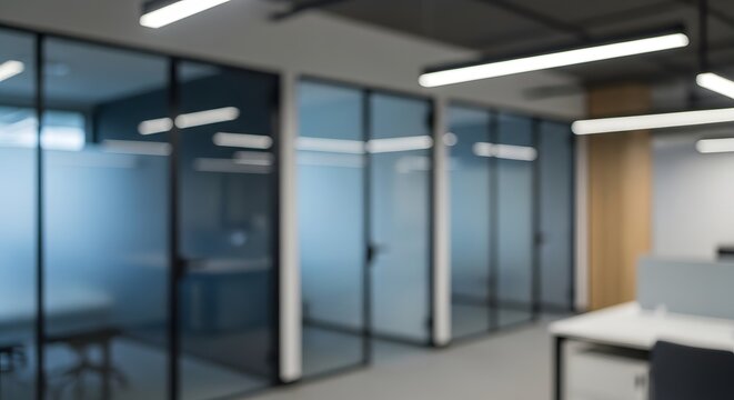 Modern glass office partition walls in workspace