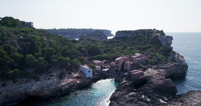 Coastal Houses and Clear Water at Cala S Almonia Mallorca