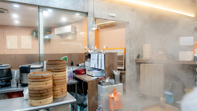 Interior of a Taiwanese restaurant with dumpling steamers