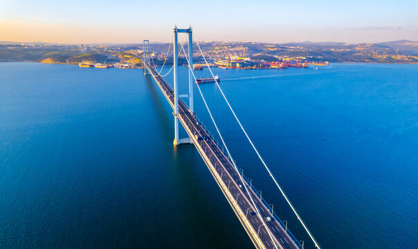 Osmangazi Bridge in Kocaeli, Turkey. Aerial shot with drone. Beautiful sunset landscape.