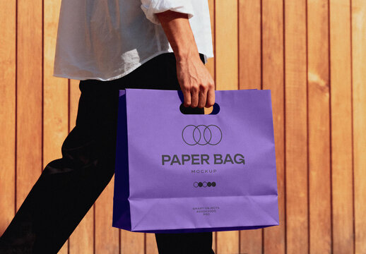 Paper Bag Mockup &ndash; in Hand Packaging Branding Presentation (PSD)