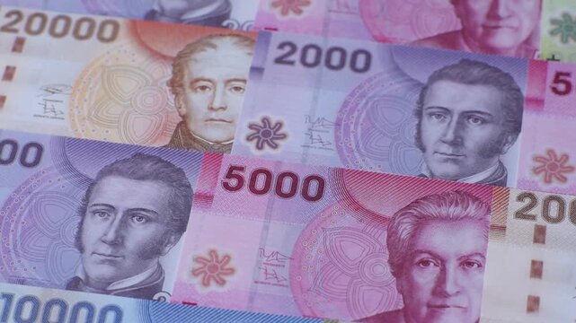 Chilean paper currency, peso, for financial transactions and exchange. Chilean peso currency as a background for your design
