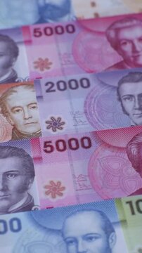 Chilean paper currency, peso, for financial transactions and exchange. Chilean peso currency as a background for your design