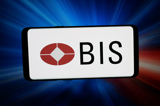 Stuttgart, Germany - 04-16-2026: In this photo illustration, the logo of Bank for International Settlements (BIS) is displayed on a smartphone in front of abstract background on computer screen.