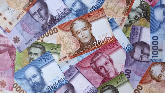 Chilean paper currency, peso, for financial transactions and exchange. Chilean peso currency as a background for your design