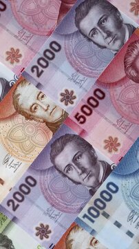 Chilean paper currency, peso, for financial transactions and exchange. Chilean peso currency as a background for your design
