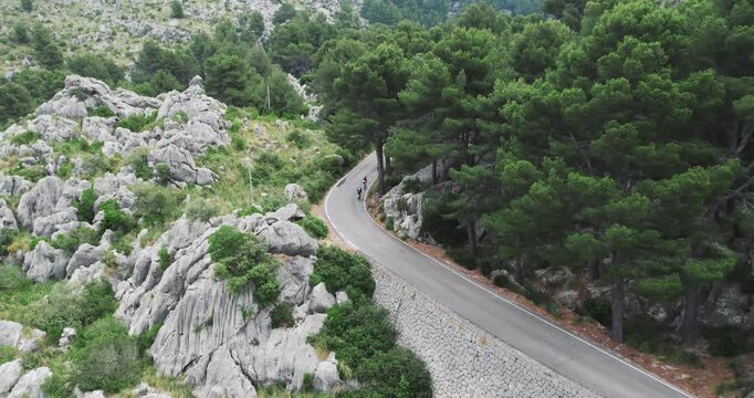 Cyclists on Winding Sa Calobra Road in Mallorca Spain