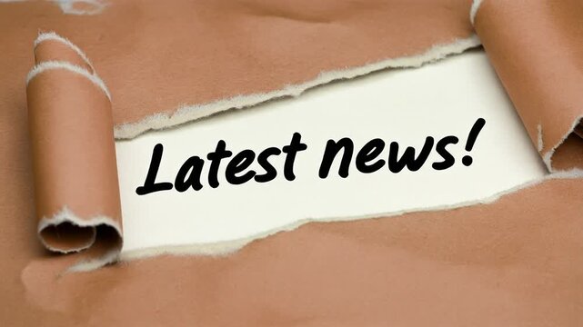 Stop-Motion Animation of "Latest news!" Appearing Through Torn Brown Paper