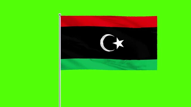 Libyan Flag: The flag of Libya proudly waving against a clean backdrop, capturing the essence of national identity and unity.