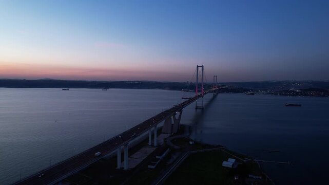 Osmangazi Bridge in Kocaeli, Turkey. Aerial shot with drone. Beautiful sunset landscape. 