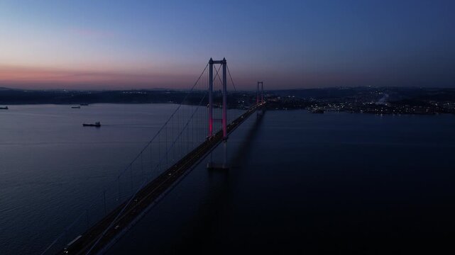 Osmangazi Bridge in Kocaeli, Turkey. Aerial shot with drone. Beautiful sunset landscape. 