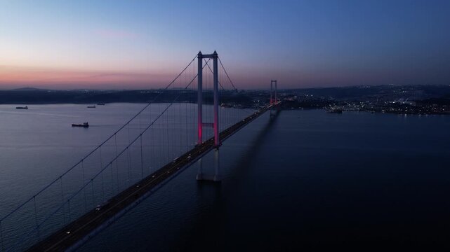 Osmangazi Bridge in Kocaeli, Turkey. Aerial shot with drone. Beautiful sunset landscape. 
