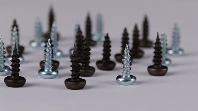 Metal screws for fastening equipment. Soft focus. Close-up. 
