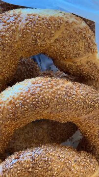 Closeup of Turkish simit with sesame seeds, ideal as a food background or for bakery themes