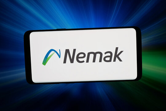 Stuttgart, Germany - 04-23-2026: In this photo illustration, the logo of Mexican automotive parts company Nemak is displayed on a smartphone in front of abstract background on computer screen.