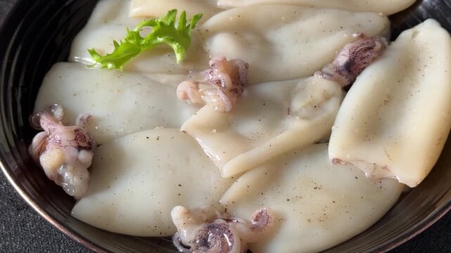 Raw squid fresh seafood marinated tasty snack fresh gourmet food background on the table  rustic food top view copy space pescetarian diet