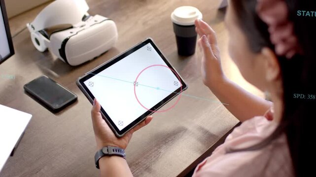 Woman holding tablet and adjusting angle, tapping center marker, calibrating animated technology UI