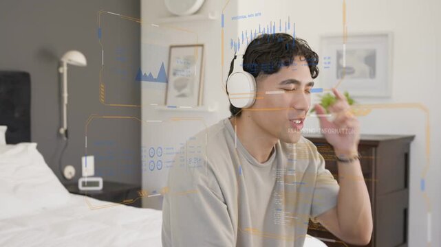Adult male wearing white headphones, audio starting, singing, gesturing while music UI animating