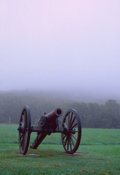Film photo of Civil War cannon in foggy battlefield