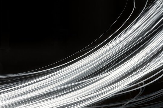 Lignes abstraites noir et blanc en mouvement cr&eacute;ant un fond graphique moderne et dynamique