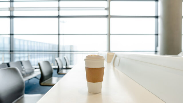 Coffee cup in airport terminal