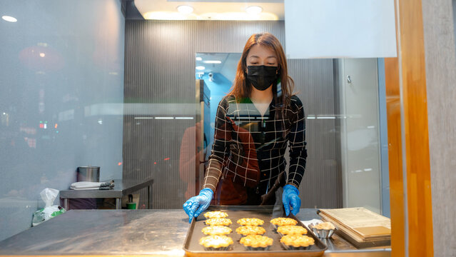 Taiwanese bakery with fresh egg tarts on display