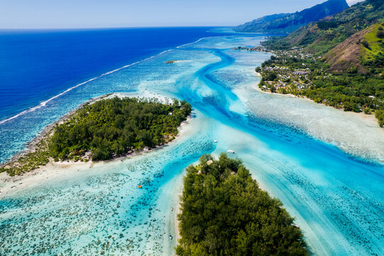 Aerial view of turquoise lagoon and reef in French Polynesia