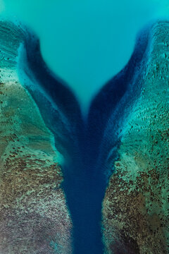 Aerial lagoon channel and reef in French Polynesia
