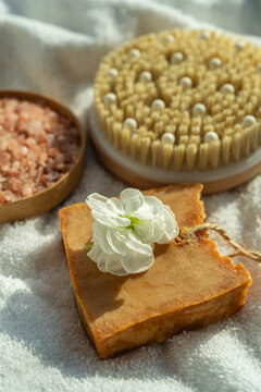 Natural spa still life with brush, salt and handmade soap
