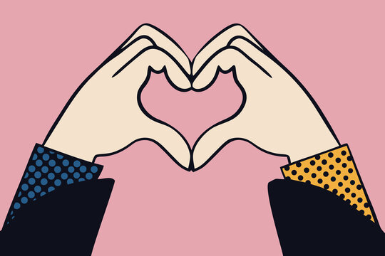 Heart symbol made with hands on pink minimal background