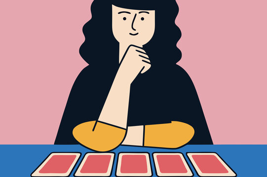 Thoughtful woman studying cards on table in bright room