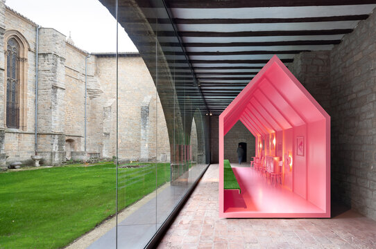 Modern exhibit inside historical Pamplona Cathedral