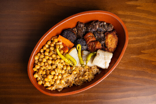 Traditional Spanish cocido with chickpeas and meats