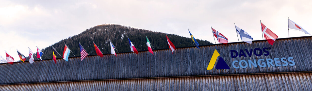 davos, graubuenden, switzerland - 20 04 2026: the famous davos congress building with flags