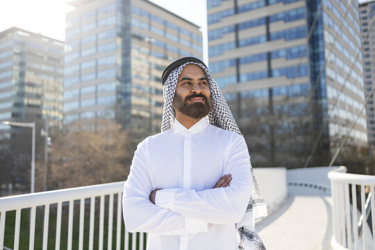 Arab businessman sheikh standing confidently in city