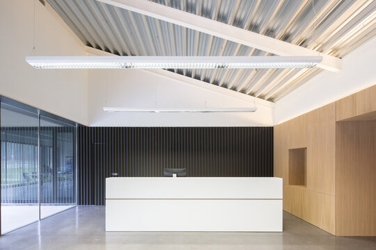 Modern candy factory reception desk in clean industrial lobby