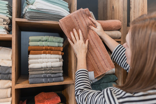 Woman shopping for textiles in a store