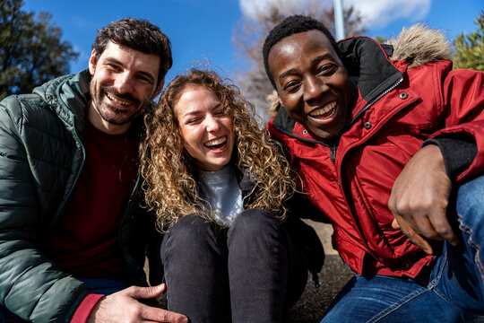 Friends enjoying a happy moment together outdoors