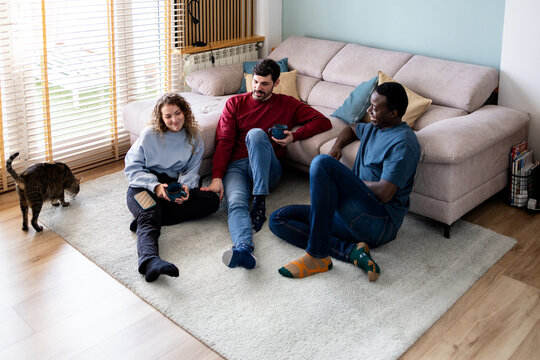 Friends enjoying a cozy gathering at home